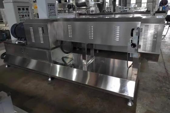 Animale domestico gemellato degli spuntini del cane di colore di torsione che fa macchina che mastica produzione alimentare