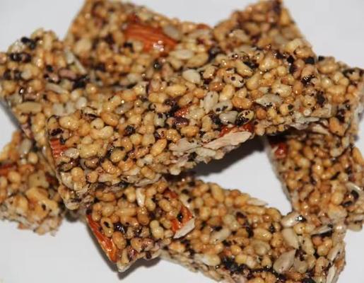 Barra di arachide della barra del cereale che fa macchina, macchina di soffio del cereale