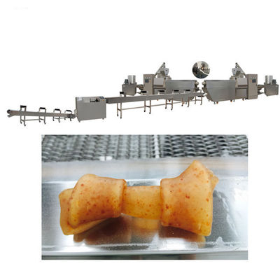 Il cane che mastica l'espulsore/animale domestico del cibo per cani degli ossequi tratta l'espulsore di masticazioni